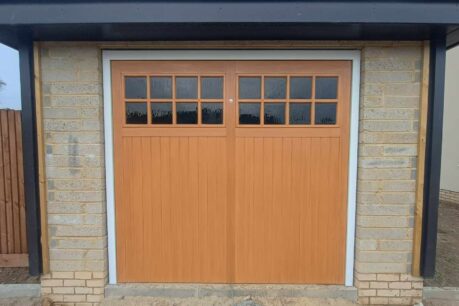 Chertsey GRP Up and Over Light Oak Black Glazing