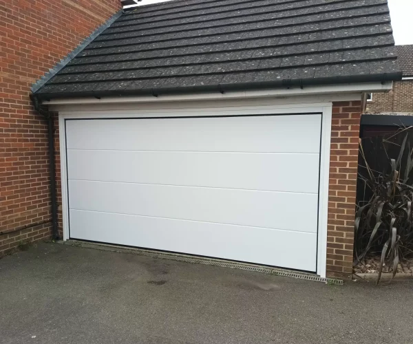 Image-10-Sectional-Garage-Door-Flush-Smooth-Vertical-Lift-Novoferm-with-Electric-Operator-scaled