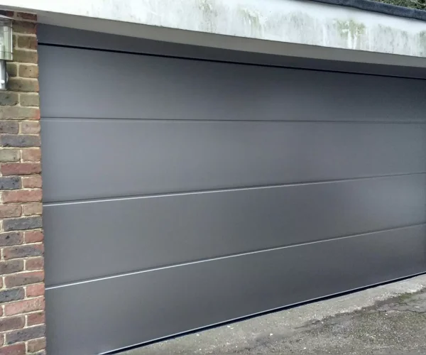 Image-2-Flush-Smooth-Vertical-Lift-Sectional-Garage-Door-in-Anthracite-Grey-Double-Size-scaled