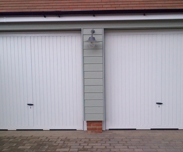 Two Steel White Garage Doors